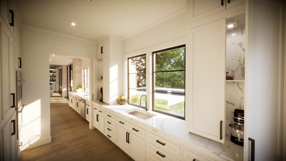 Modern, bright kitchen with white cabinets, marble countertops, large window, and open shelving.  Hardwood flooring throughout.