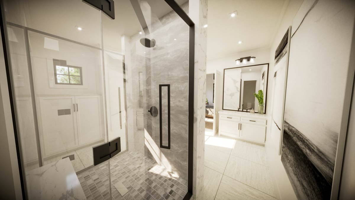 A modern bathroom with a glass-enclosed shower, marble accents, and a large mirror. Bright and spacious with a touch of art.